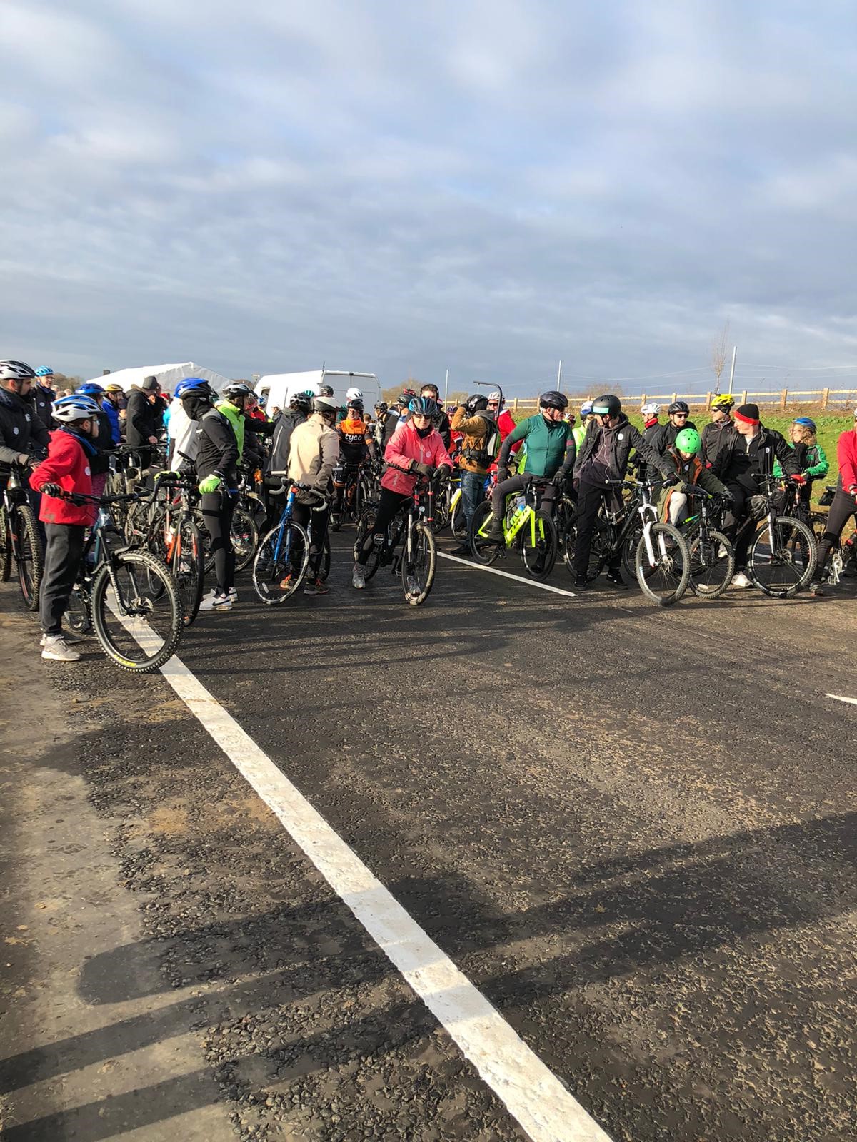 Cyclists prepare to cross the bypass