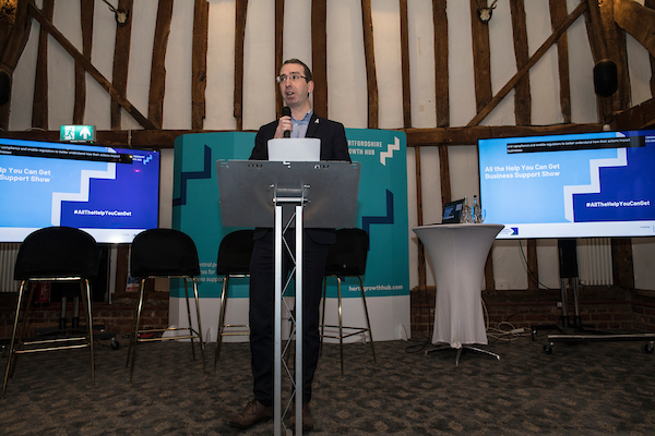 Mayor Peter Taylor speaks to delegates