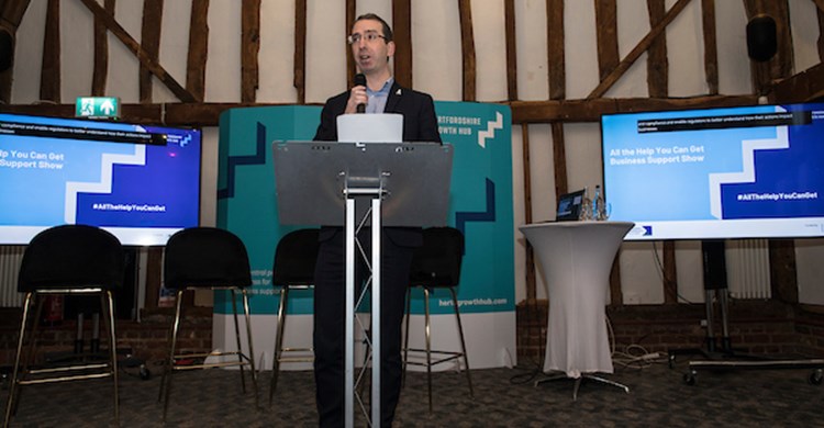 Mayor Peter Taylor speaks to delegates
