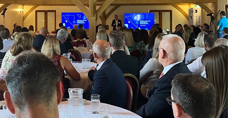 Cllr Richard Roberts delivers speech to a full house