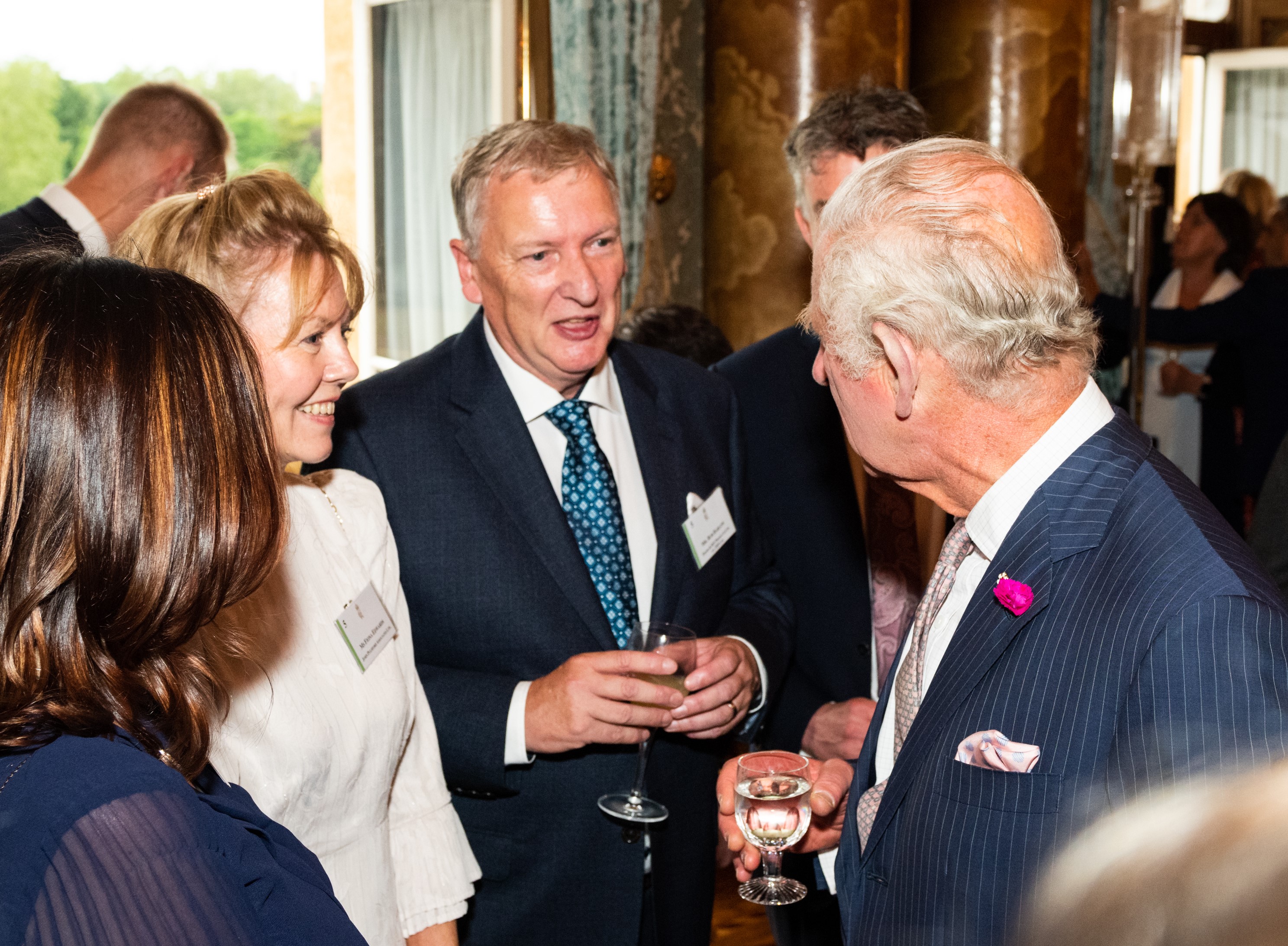 Fiona Edwards (in white), Head of Sustainability, JPA Workplaces, speaking to King Charles III