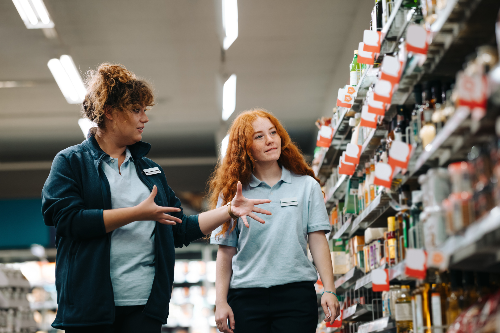 Two Young Supermarket Workers